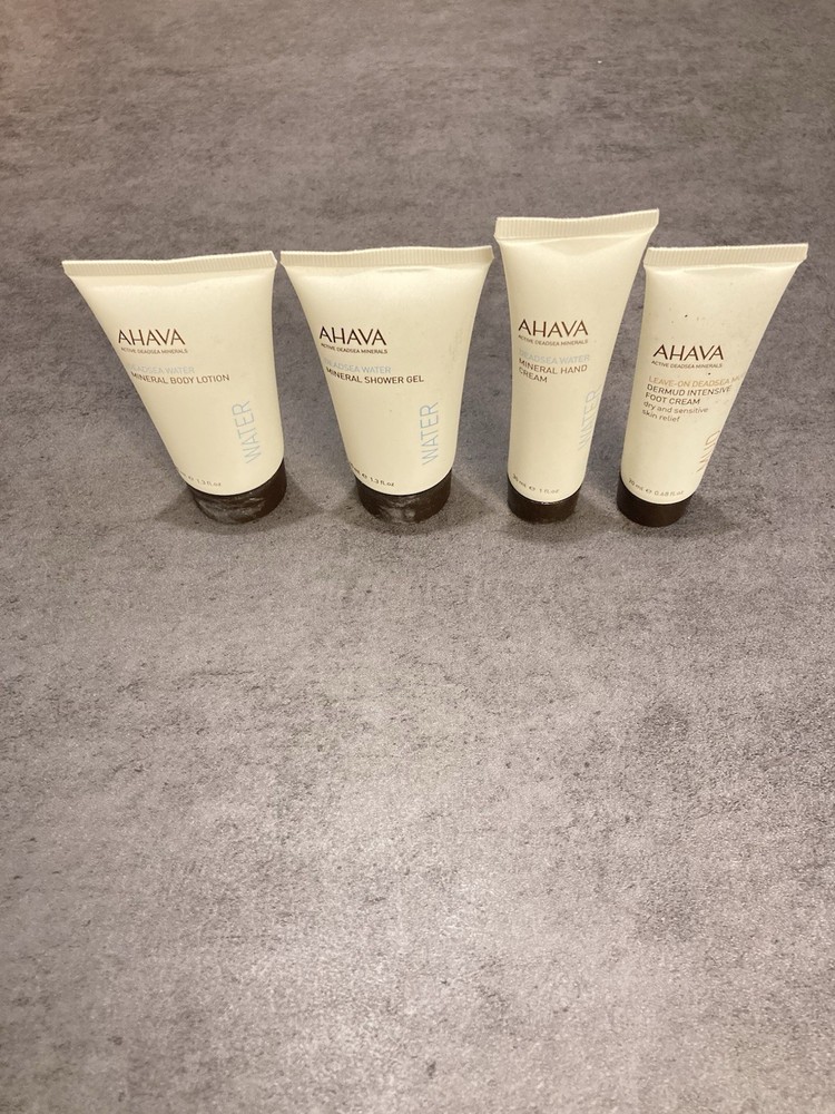 AHAVA 4 PC TRAVEL SIZE SHOWER GEL, BODY LOTION, HAND AND & FOOT CREAM WITH BAG
