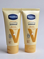 Vaseline Essential Healing Hand and Body Lotion – 2 fl oz Pack of 2